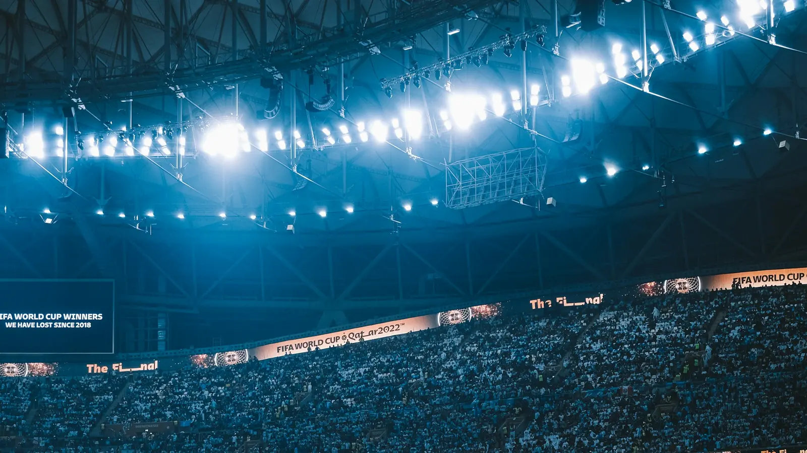 Stadium full of fans watching a soccer match